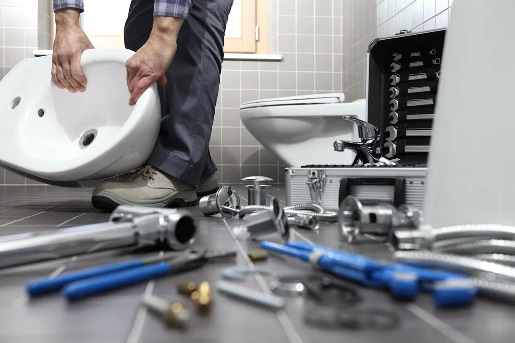 Plumbing tools prepared for a bathroom repair in Edgewater